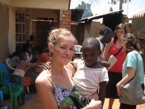 Notes From Kampala: For the Least of These; Reta holding one of the children at Oasis Orphanage (Photo by Reta Raymond)